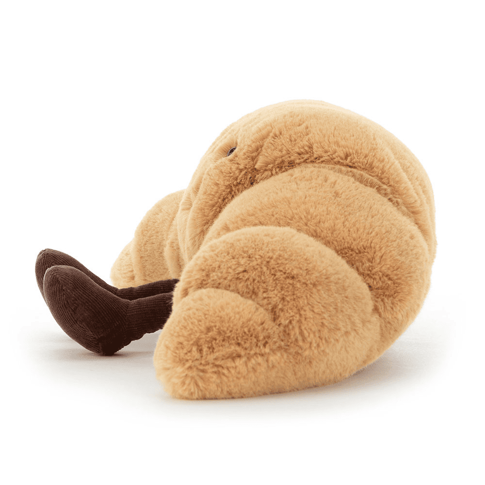 Peluche croissant de coté sur fond blanc 