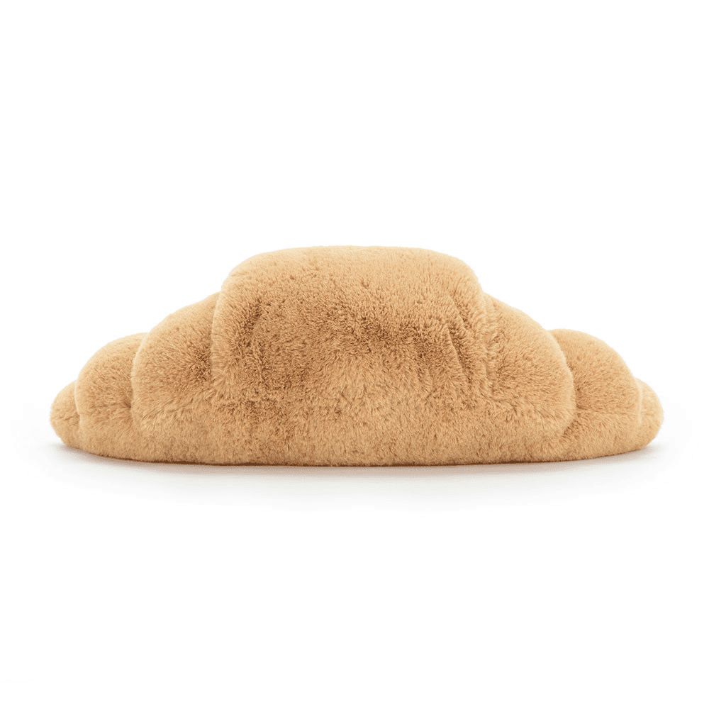 Peluche croissant de dos sur fond blanc 