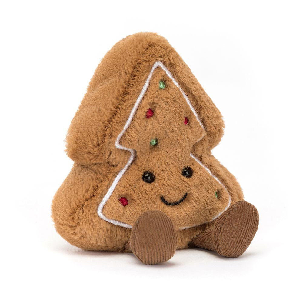 peluche  cookie en forme de sapin de face avec un visage qui sourit et avec des petites perle vertes et rouges 