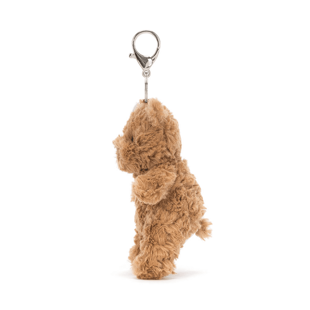 porte clé peluche ours brun de coté sur fond blanc 