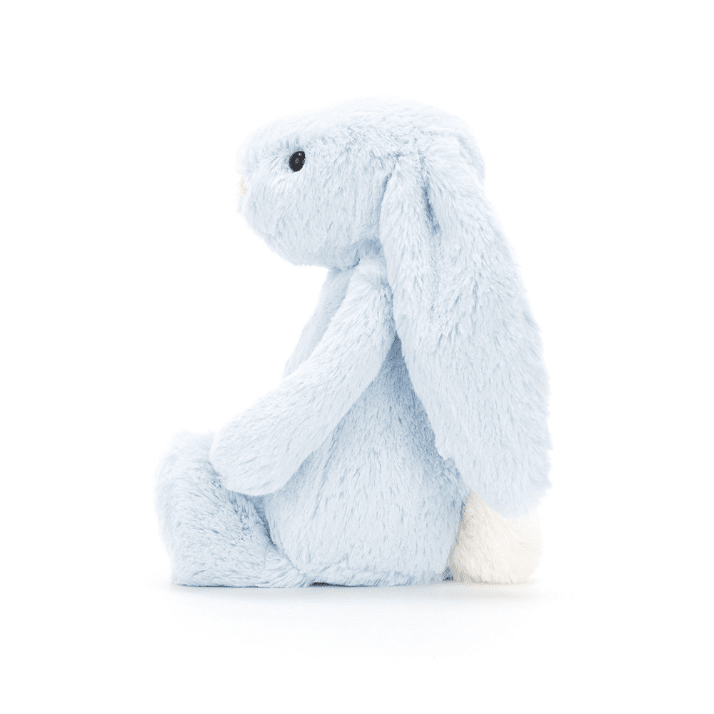 Peluche lapin bleu de coté sur fond blanc 