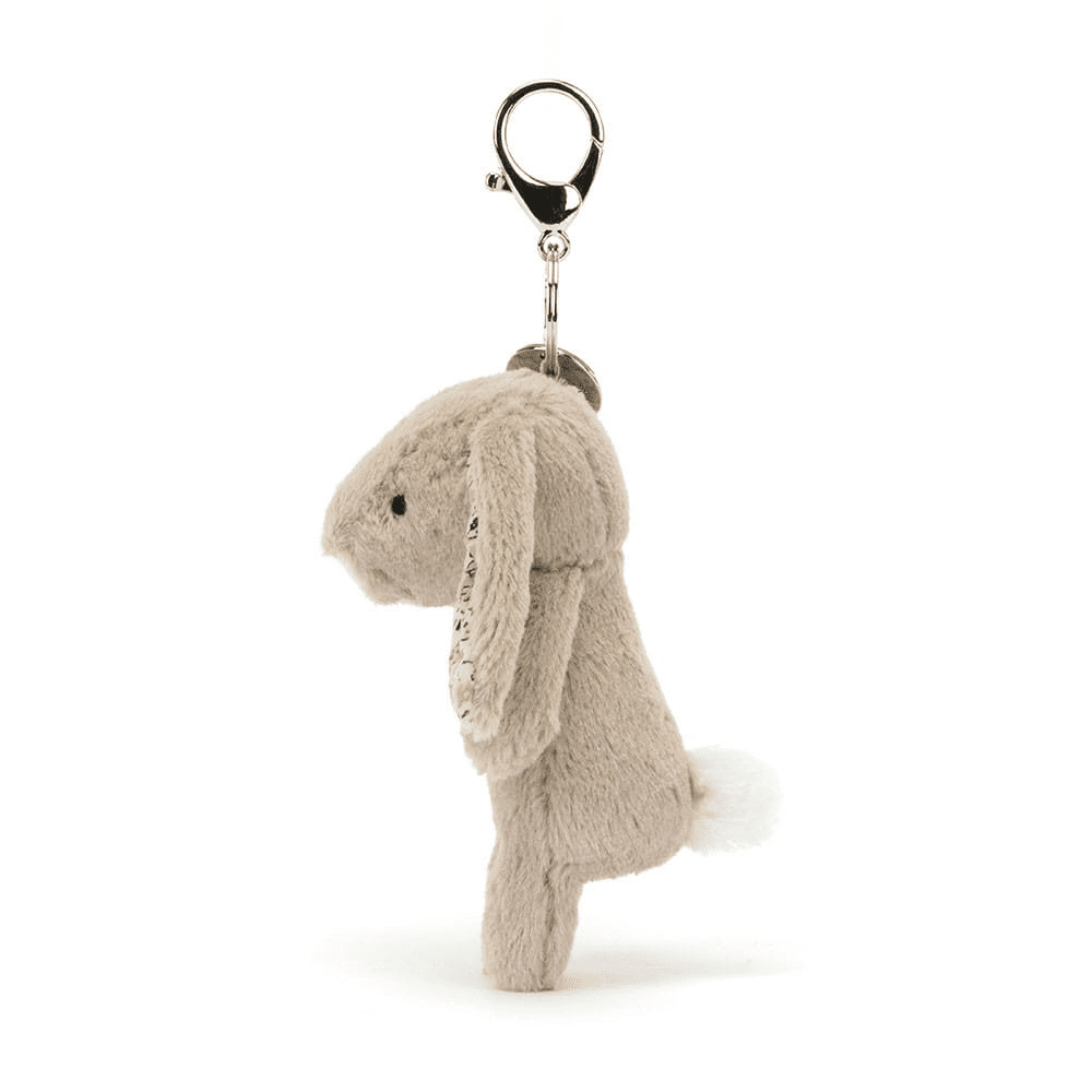 Blossom Beige Bunny Bag Charm de coté sur fond blanc 