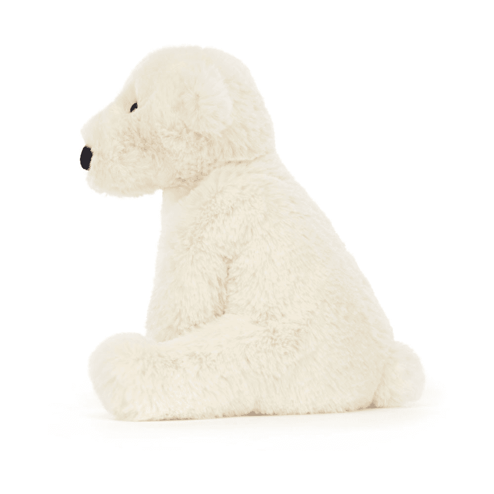 peluche ours polaire de coté sur fond blanc 