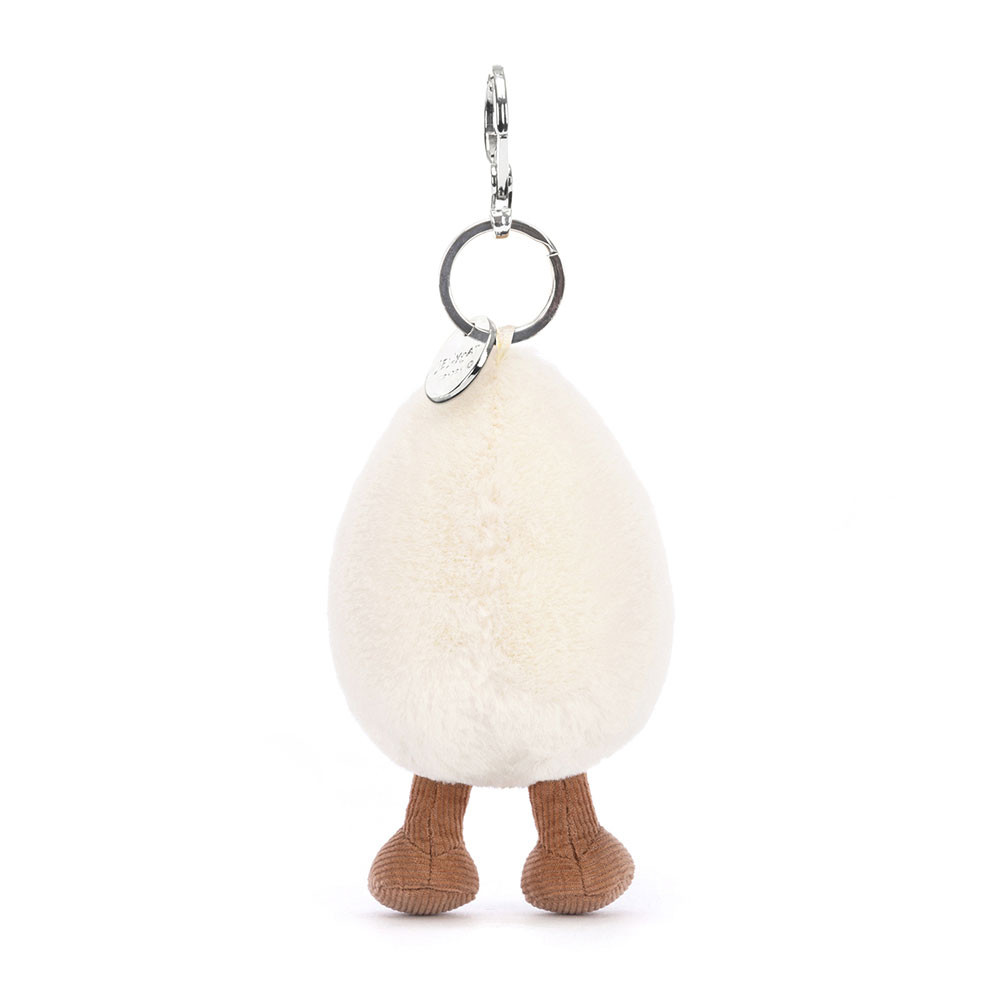 peluche porte clé en forme d'œuf dur de dos sur fond blanc