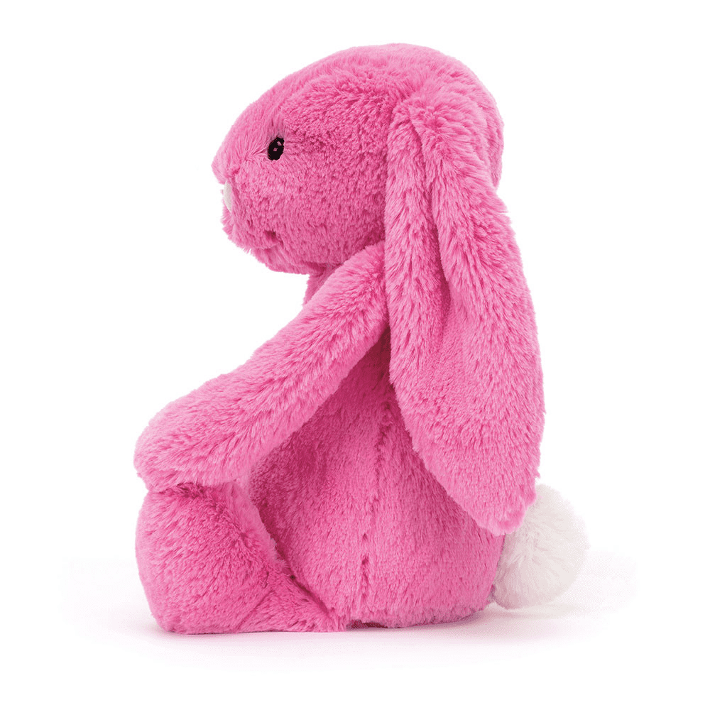 peluche lapin rose de coté sur fond blanc