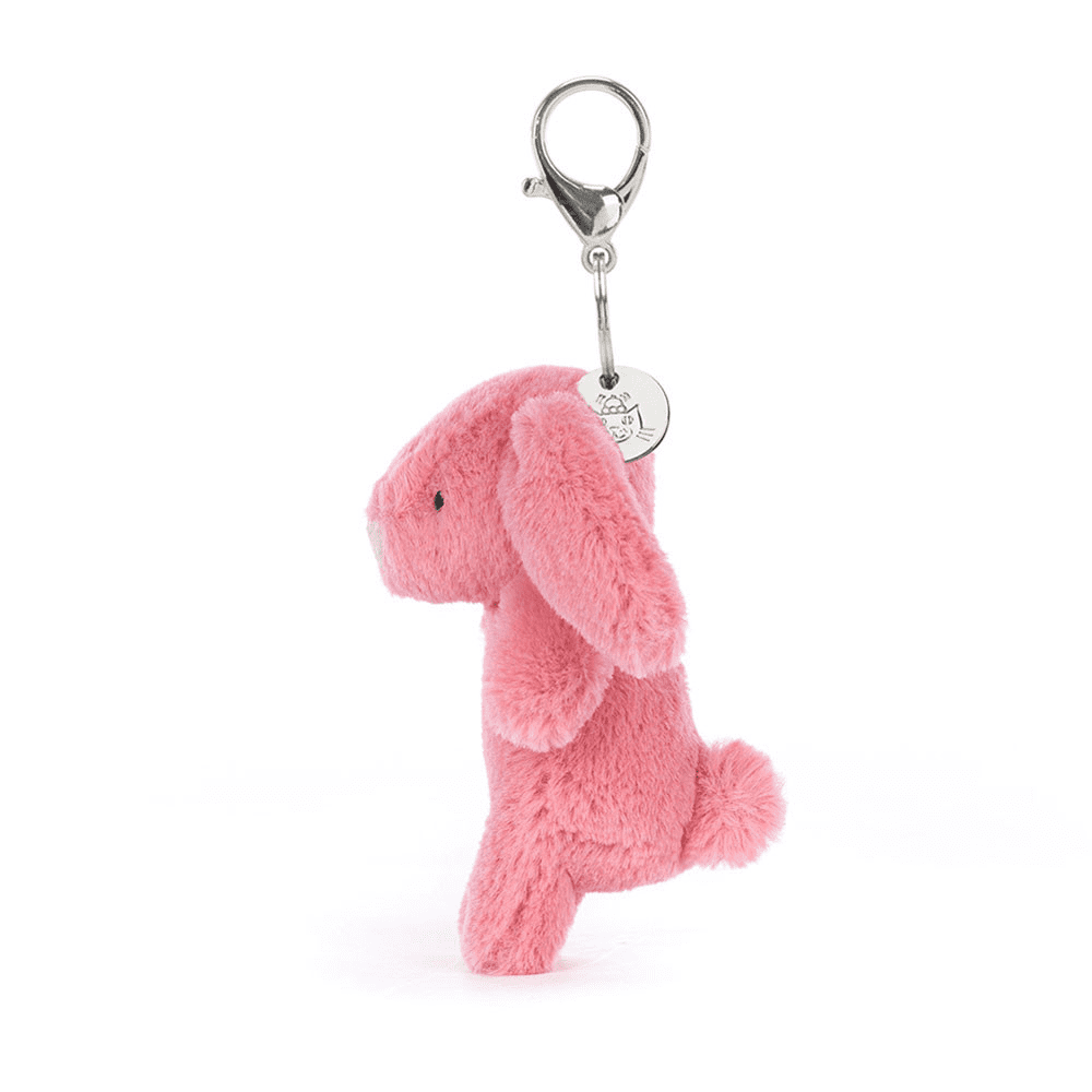 Porte clé lapin rose en peluche de coté sur fond blanc