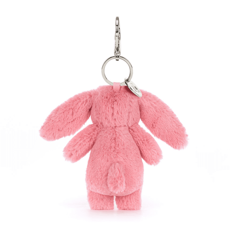 Porte clé lapin rose en peluche de dos sur fond blanc