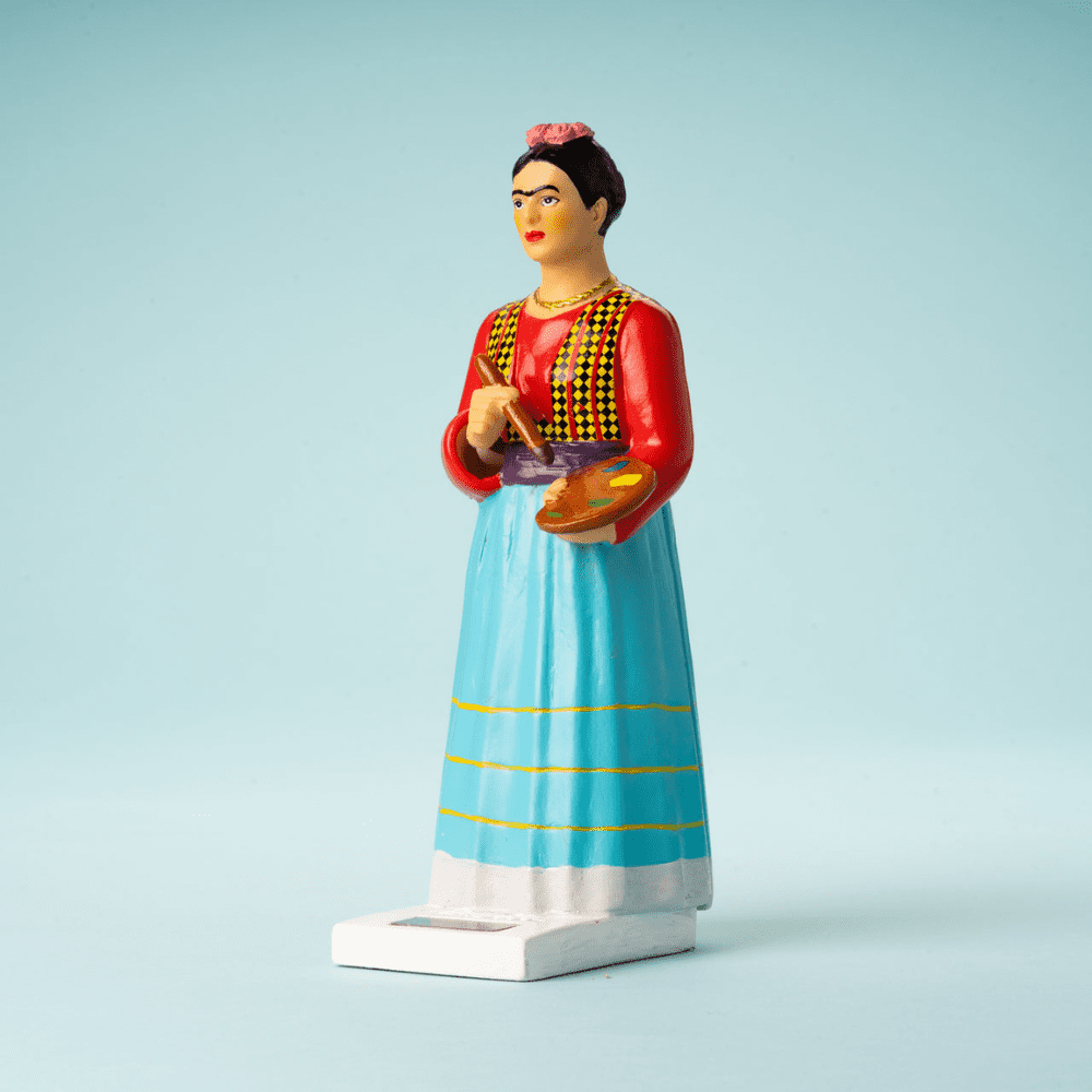 figurine solaire Frida sur fond bleu ciel