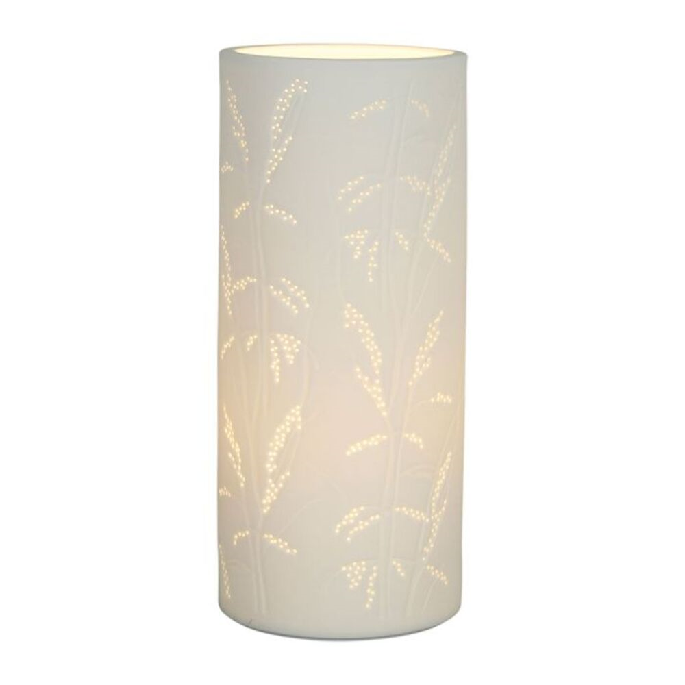 lampe cylindrique blanche avec motifs sur fond blanc