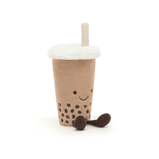 Peluche en forme de boisson bubble tea sur un fond blanc