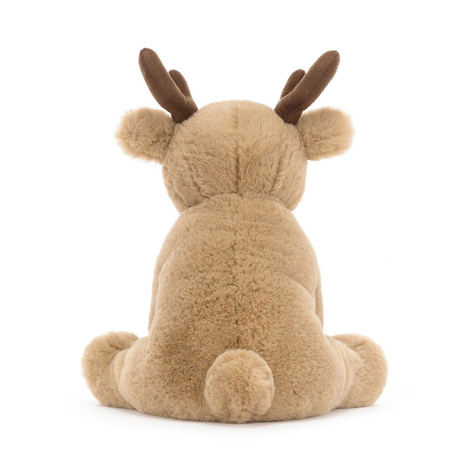 peluche renne avec un nez rouge assis de dos de la marque jellycat