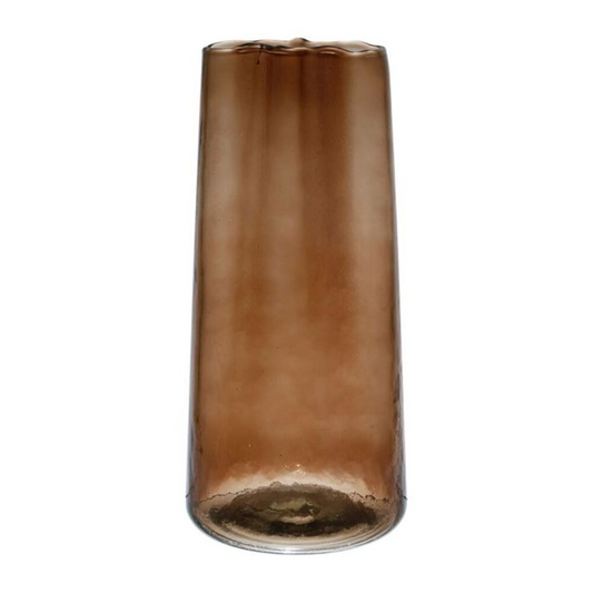 vase bronzé cylindrique sur fond blanc 